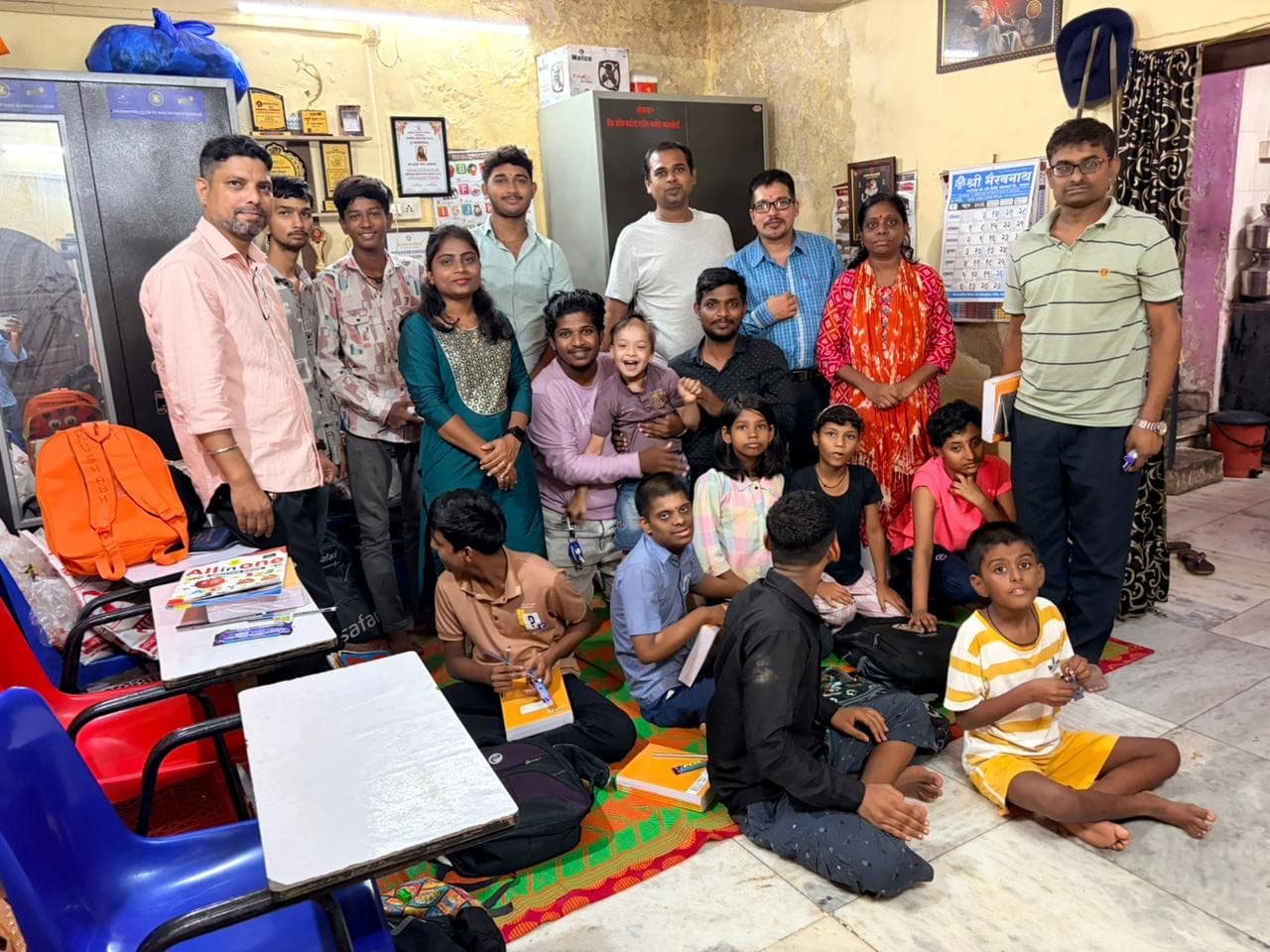 Distribution of notebooks and school supplies to students at Ratnamala Deaf and Mentally Challenged Vidyamandir, Kalamboli